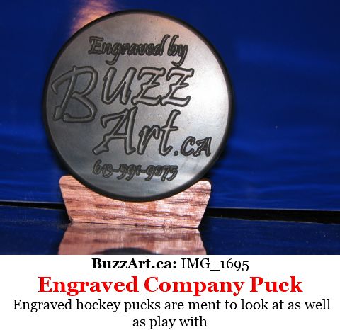 Buzz Art promotional hockey puck